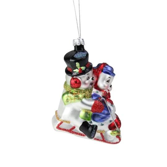 Northlight 4.5" White & Red Cheerful Sledding Snowmen Couple Glass Christmas Ornament 3 Northlight 4.5" White & Red Cheerful Sledding Snowmen Couple Glass Christmas Ornament - Image 3