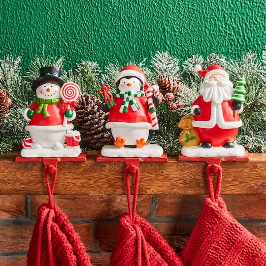 Glitzhome® 7" Santa, Snowman & Penguin Stocking Holder Set 3 Glitzhome® 7" Santa, Snowman & Penguin Stocking Holder Set - Image 3