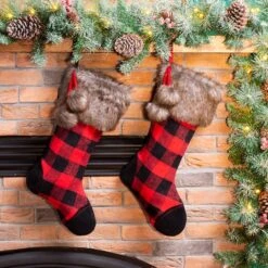 Glitzhome® 21" Black & Red Buffalo Plaid Pompom Stockings, 2ct. -Northlight Decor Store D479589S 2