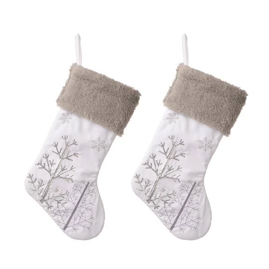 Glitzhome® 21" White Fleece Stocking With Christmas Tree & Snowflake, 2ct. 1 Glitzhome® 21" White Fleece Stocking With Christmas Tree & Snowflake, 2ct.